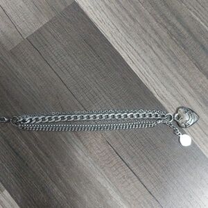 #204 Tocara Women's Heart-Shaped Silver Charm Bracelet made of stainless steel.